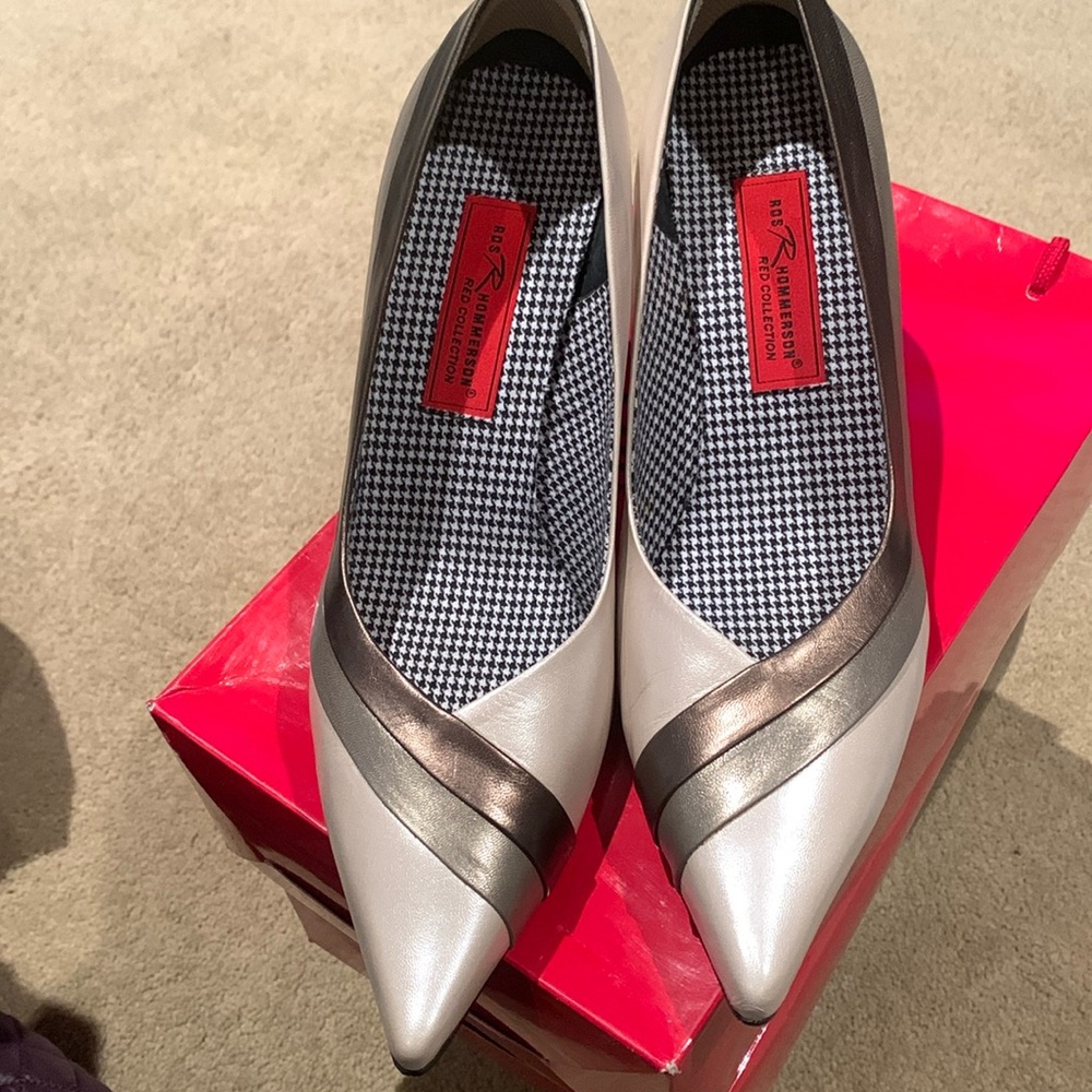 Taupe and bronze heels. Red soles.  Never worn.